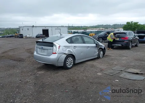 2014 Toyota Prius Plug-In from USA, damaged, VIN JTDKN3DP1E3050561